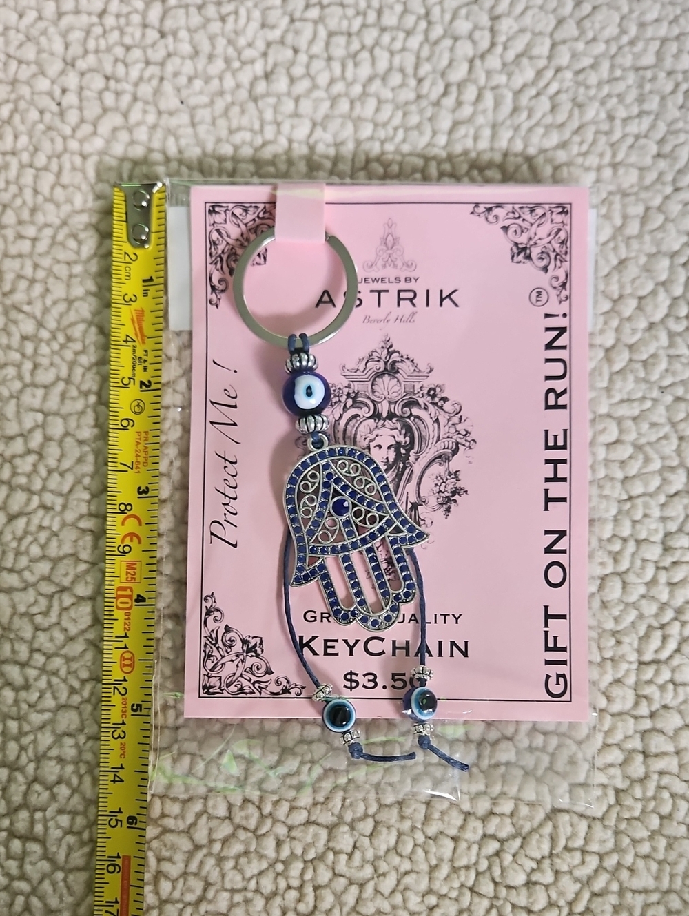Free With Purchase. Add To Bundle. Astrik Hamsa Hand Keychain - Blue